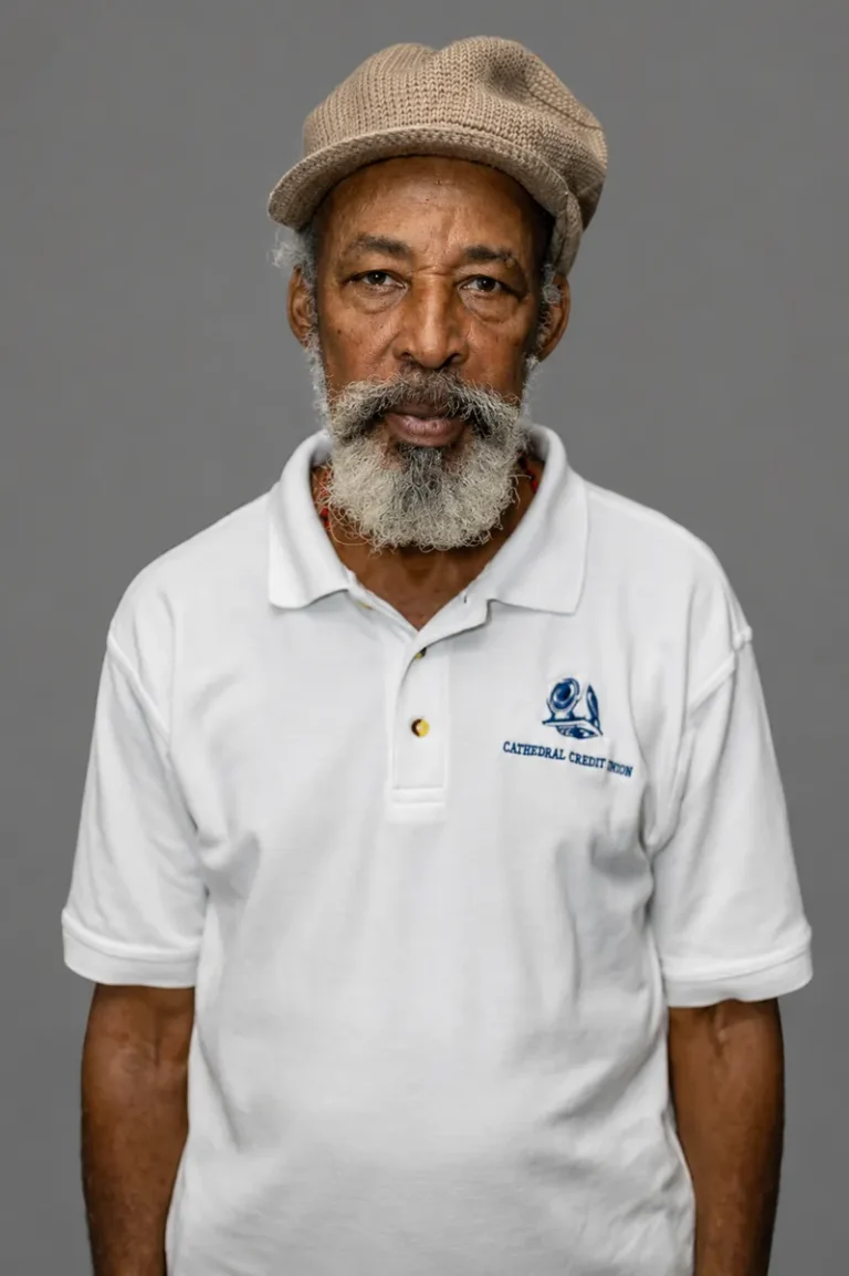 Garfield_Romuald_Lewis_-_Car_Park_Attendant__Nelson_Street_